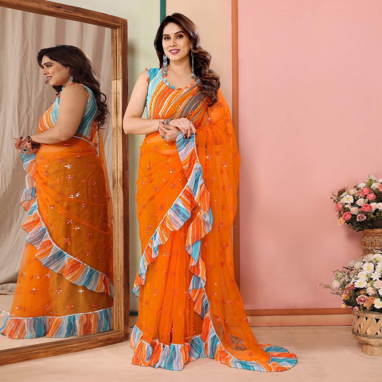 New Orange Color Mirror Work Embroidered Net Ruffle Saree With Unstiched Blouse