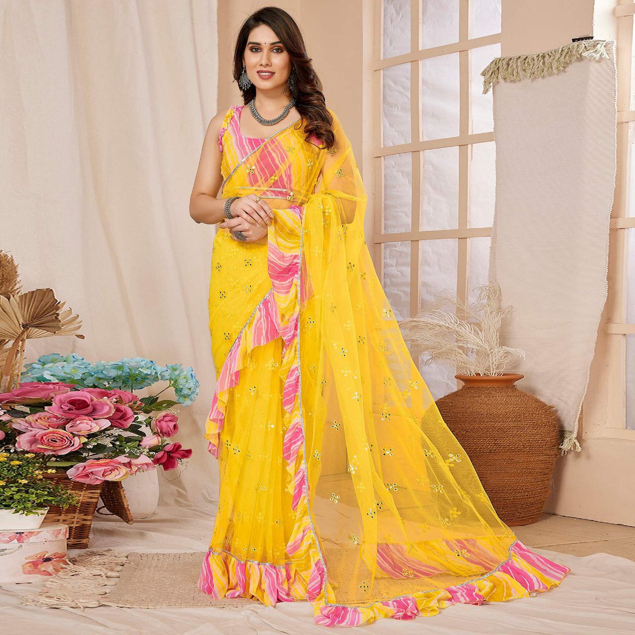 New Yellow Color Mirror Work Embroidered Net Ruffle Saree With Unstiched Blouse